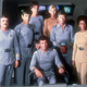 The crew of the classic Enterprise pose in their uniforms in 1979's Star Trek: The Motion Picture.